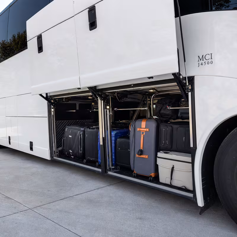 Party bus interior with wraparound leather seating and LED lighting in Tucson
