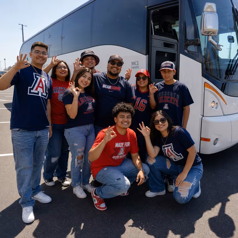 Passengers loading luggage while boarding an Tucson group shuttle